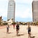 A group of cyclists riding on a bike path in Barcelona, Spain